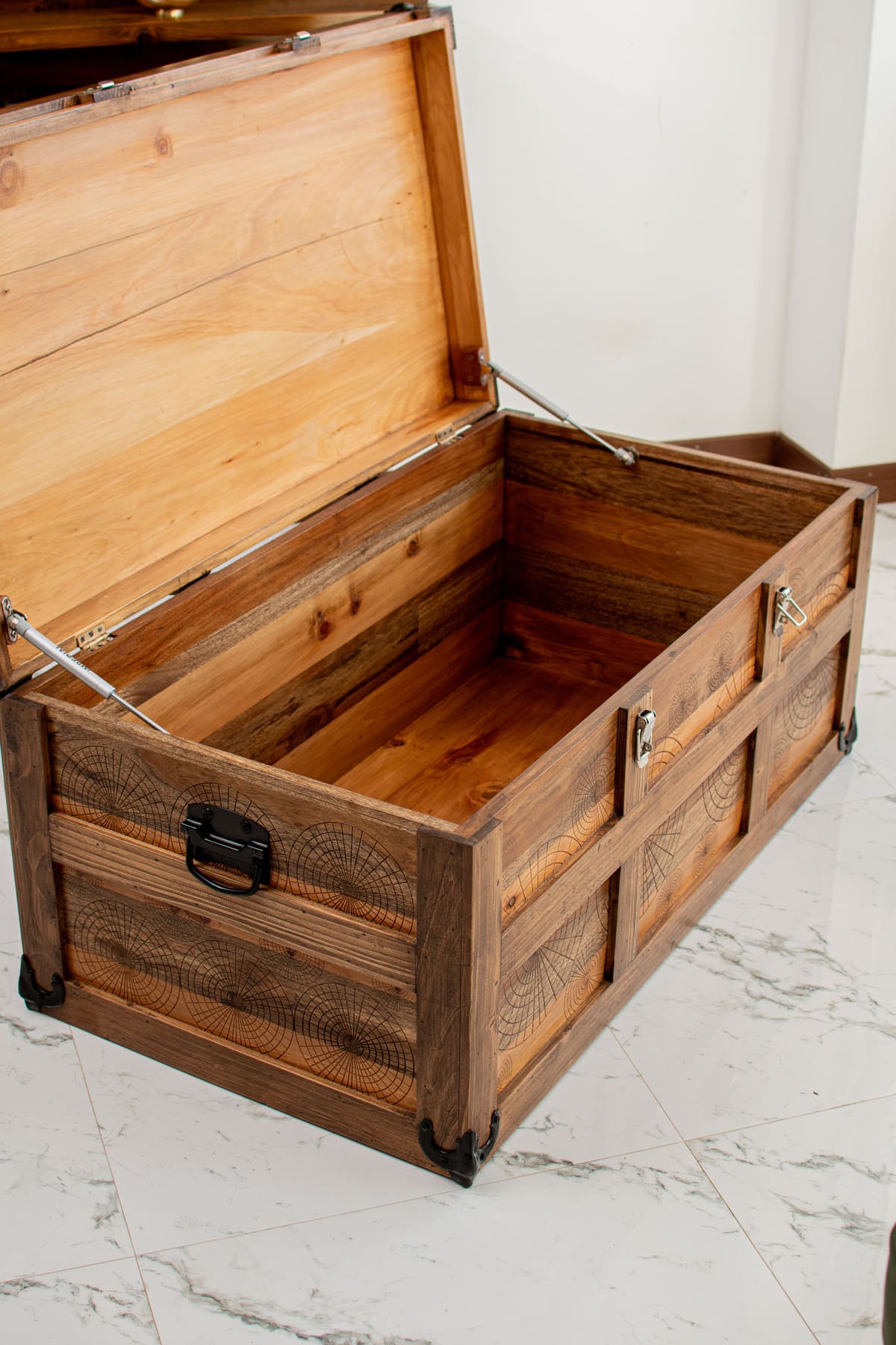 A trunk being finished by hand